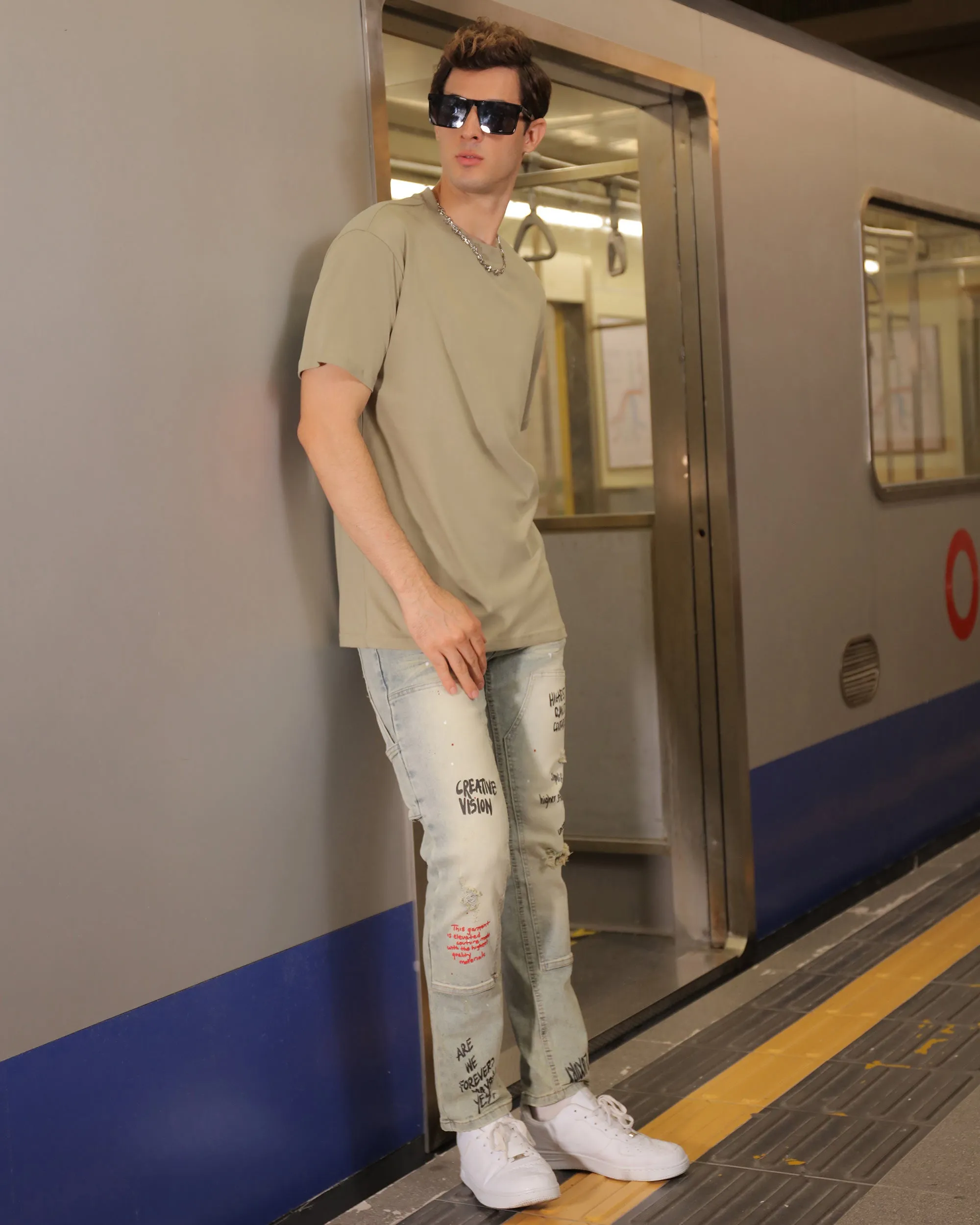 Spray Paint Graffiti Distressed Blue ripped Jeans